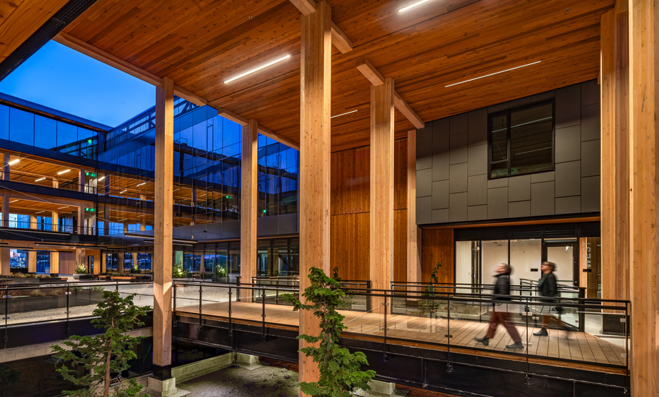 Five-story mixed-use building boasting a mass-timber structural system via cross-laminated timber, glued-laminated columns, and girders. Source: Swinerton
