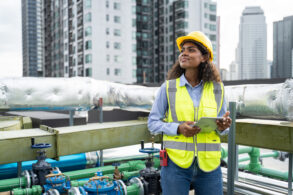 a woman using ESG tracking and compliance software for AEC industry construction project