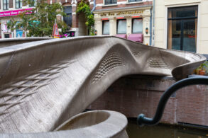 3D printed stainless steel bridge over canal in the red light district of Amsterdam.