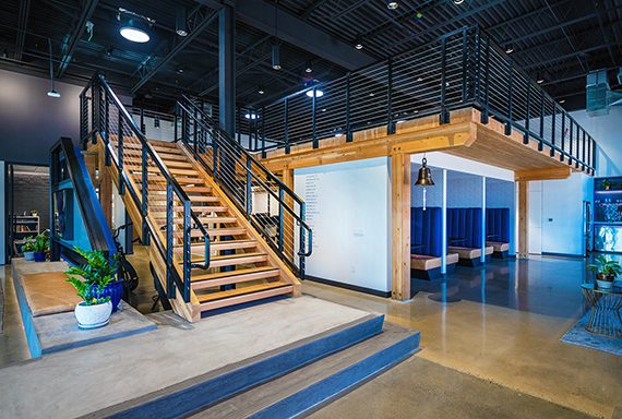 Mass timber mezzanine designed, fabricated, and installed by Swinerton’s mass timber affiliate Timberlab for the company's new Charlotte, NC, office. Source: Swinerton