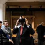 Ian Manger of BuiltWorlds shows Graham Grady of Shefsky & Froelich the IrisVR Oculus Rift Demo at Big Data Night December 2014.