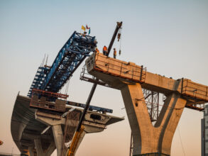 Express highway construction site with unidentified worker in Bangkok, Thailand