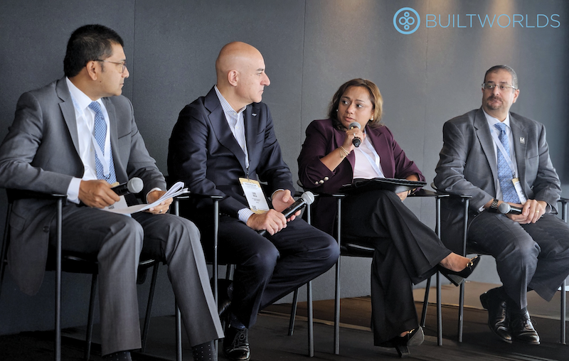 Professional woman speaking on a panel during the 2025 Infrastructure Conference by BuiltWorlds