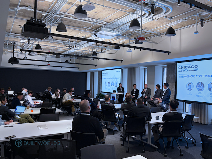 A woman and four men on stage during the 2026 Chicago Global Summit conference put on by BuiltWorlds.